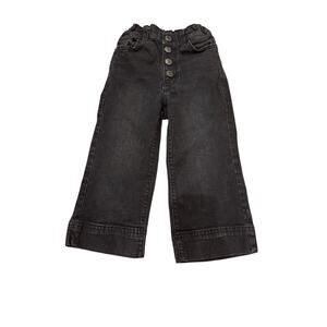 Thereabouts crop black denim pants with a button fly closure